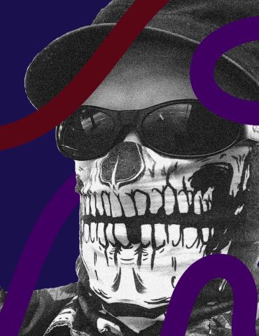 DJ Paradigm Lost headshot, wearing baseball cap, sunglasses, and skull mask