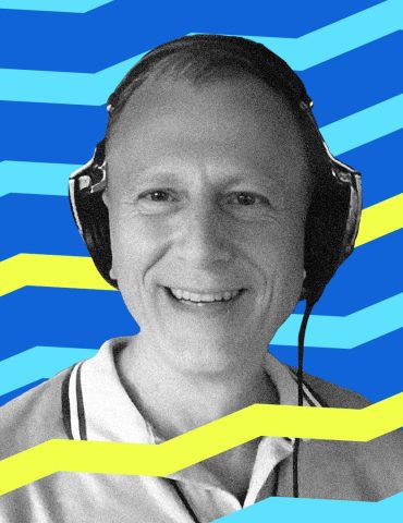 DJ Randy Schalger smiles toward the camera