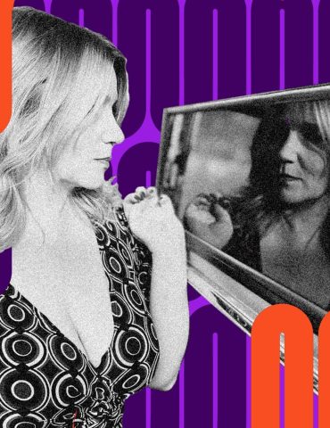 DJ Rockett Qween looks contemplatively into mirror